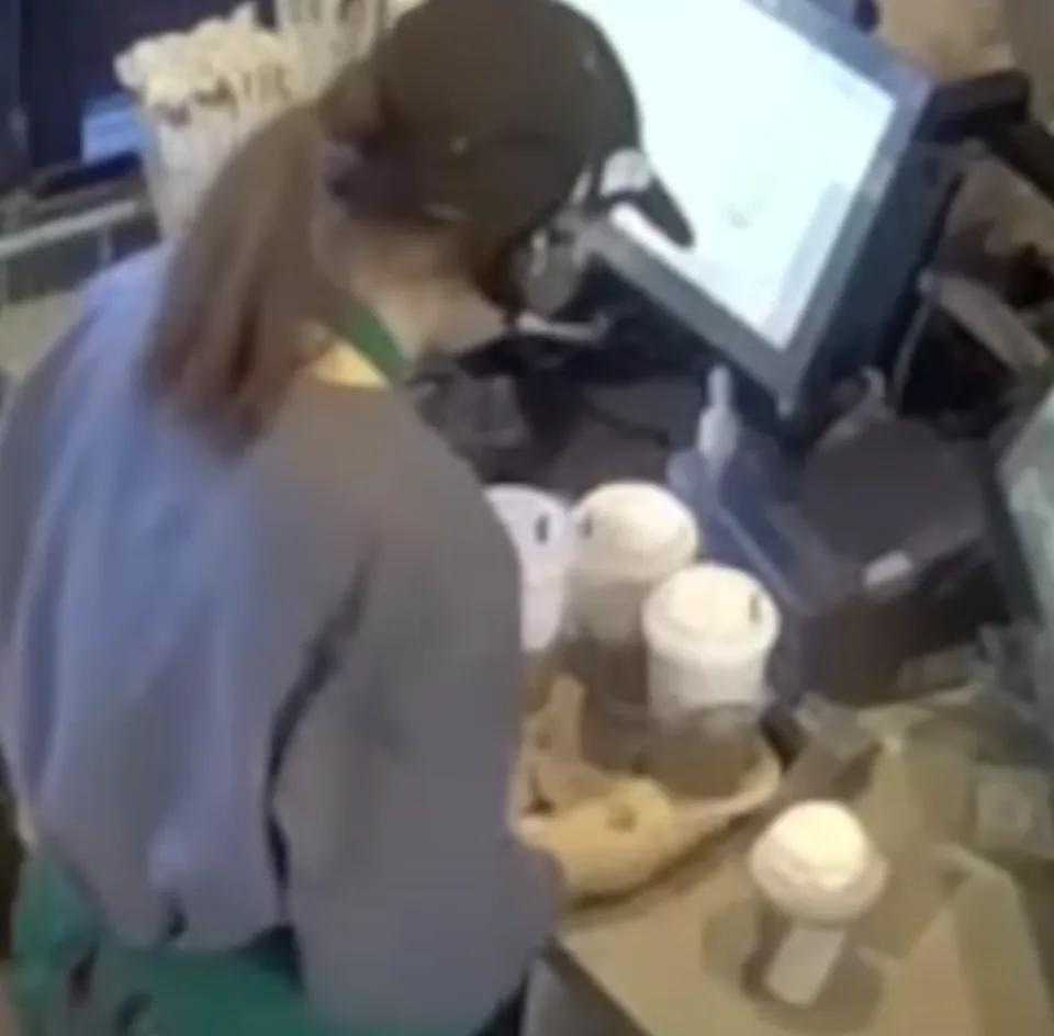 The Starbucks employee supplied a tray filled with the three beverages